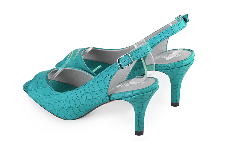 Women's turquoise blue open-toe dress pumps with back strap. Square toe. High slim heel - Rear view